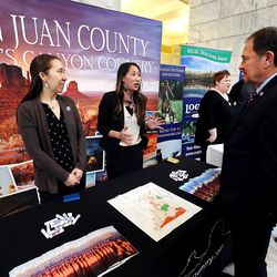 Allison Yaamoto-Sparks and Natalie Randall, of San Juan County, talk with Gov. Gary R. Herbert as he visits a few booths during Tourism Day on the Hill at the Capitol in Salt Lake City on Monday, Jan. 22, 2018.