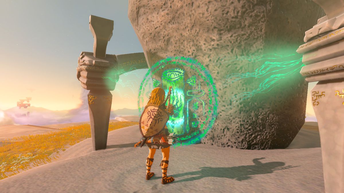 Link opens a shrine by touching its emblem in Zelda: Tears of the Kingdom