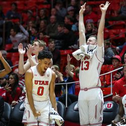 Utah Utes celebrate a point over the California Golden Bears at the Huntsman Center in Salt Lake City on Saturday, Feb. 10, 2018.