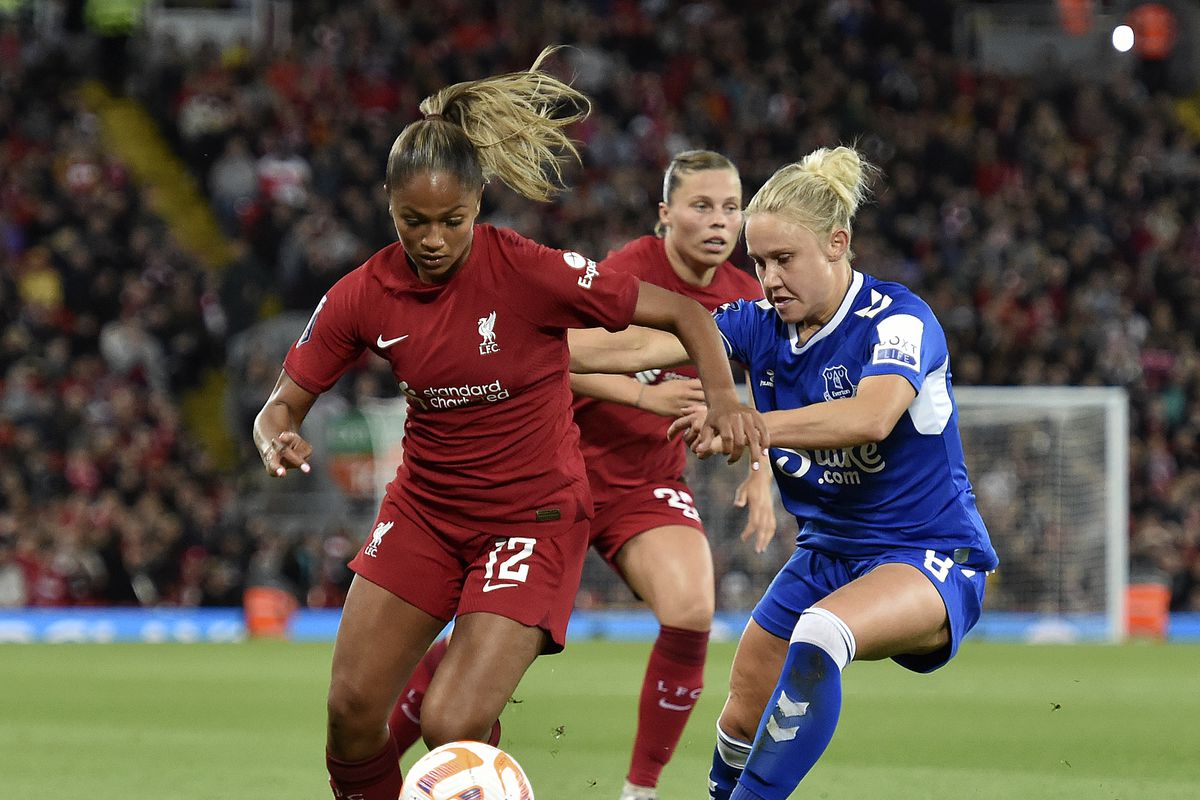Taylor Hinds of Liverpool Women and Izzy Christiansen of Everton Women in action during the FA Women’s Super League match between Liverpool FC and Everton FC at Anfield on September 25, 2022 in Liverpool, United Kingdom.