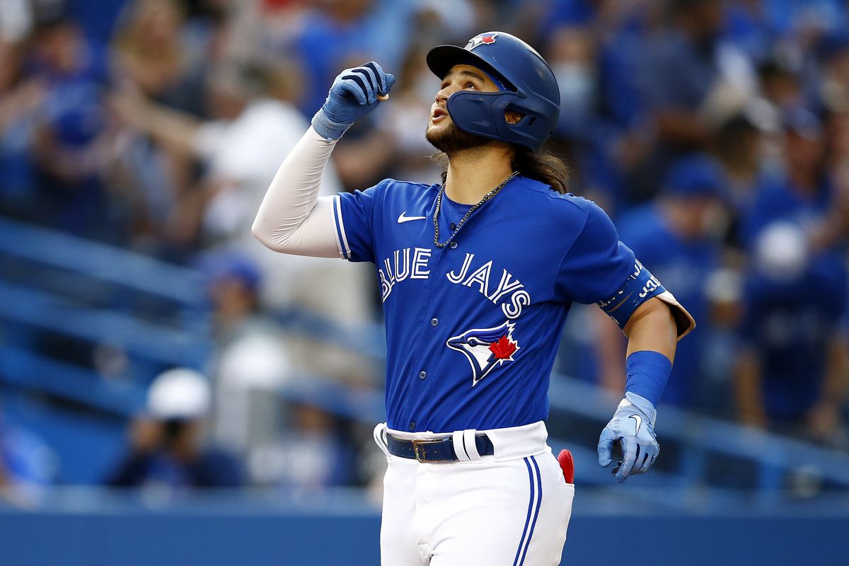 Bo Bichette #11 of the Toronto Blue Jays celebrates after hitting a home run in the fifth inning during a MLB game against the Baltimore Orioles at Rogers Centre on October 2, 2021 in Toronto, Ontario, Canada.