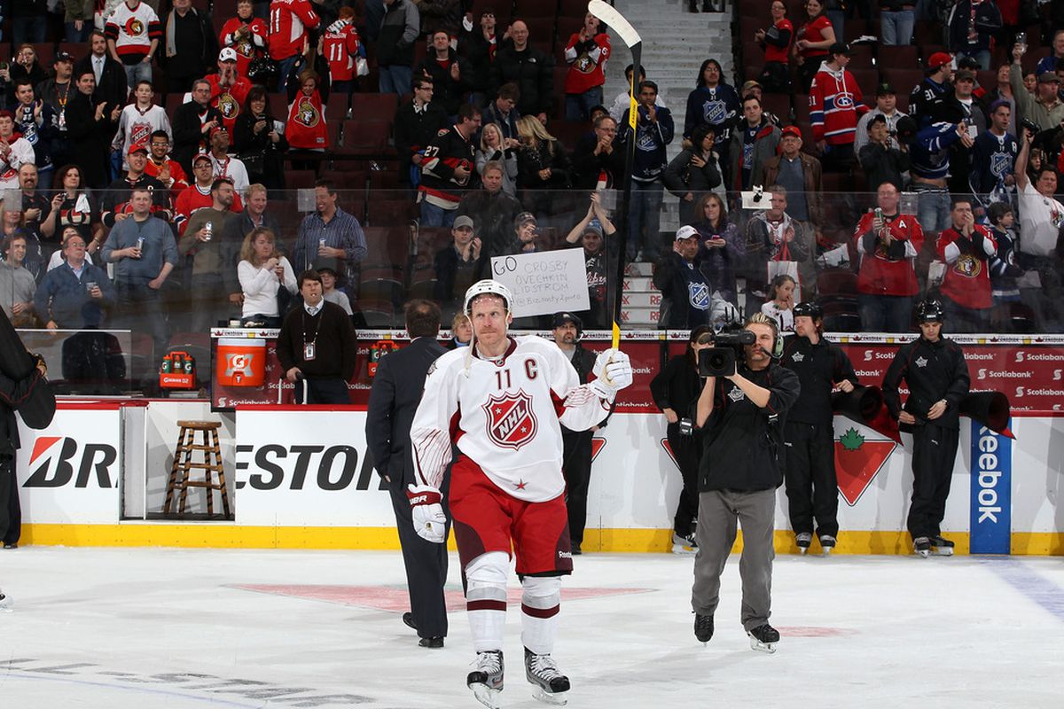 Alfie and the fans salute each other at the NHL All-Star game. (Photo by Christian Petersen/Getty Images)