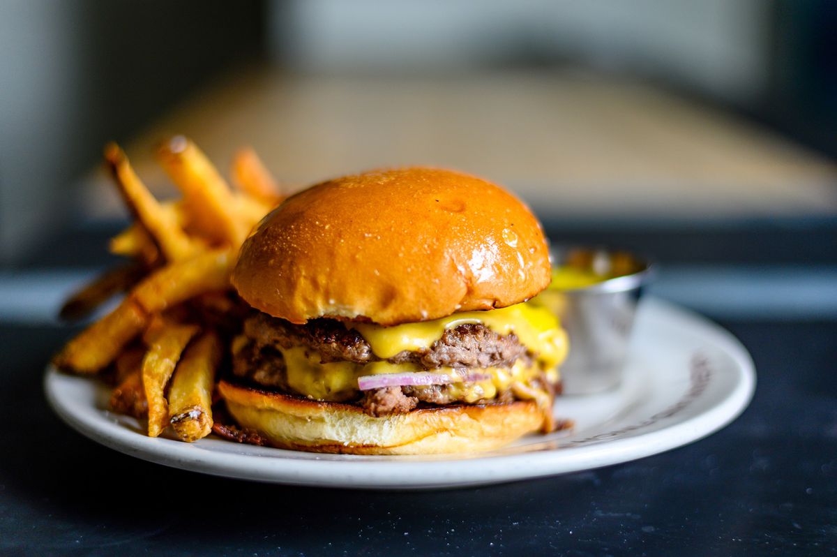The H&amp;F double stack cheeseburger and fries from Holeman and Finch Public House in Atlanta. 