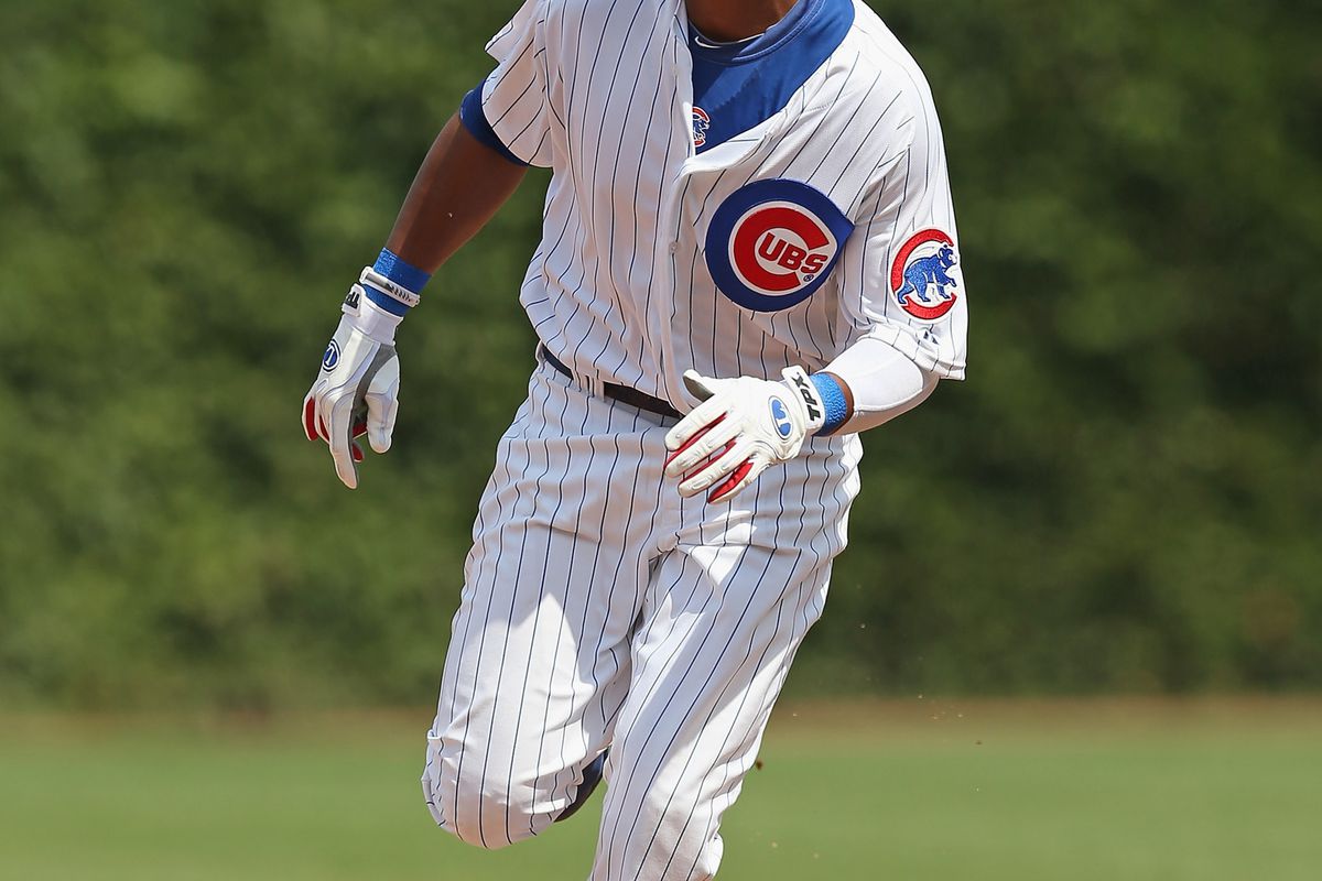 Starlin Castro #of the Chicago Cubs watches the flight of his two-run home run as he runs the bases against the Houston Astros at Wrigley Field in Chicago, Illinois. (Photo by Jonathan Daniel/Getty Images)
