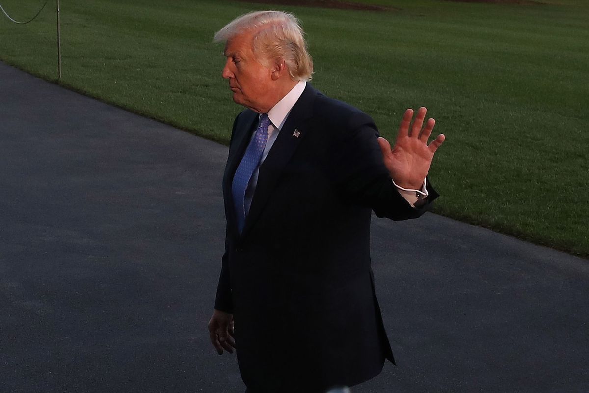 U.S. President Donald Trump waves as he walks toward the White House after arriving on Marine One on Sept. 27, 2017, in Washington, D.C.