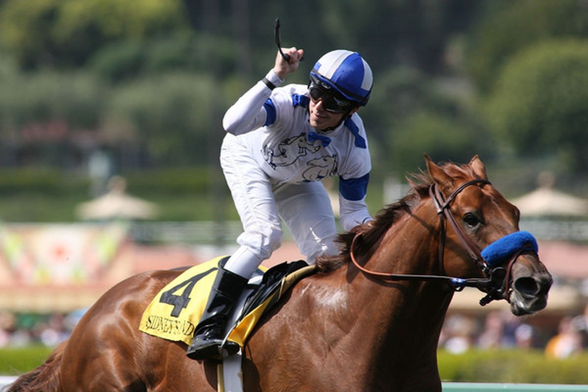 ARCADIA, CA - APRIL 03: Jockey Joseph Talamo celebrates after riding Sidney's Candy to victory in the 73rd running of the Grade I Santa Anita Derby on April 3, 2010 at Santa Anita Race Track in Arcadia, California. (Photo by Jeff Golden/Getty Images)