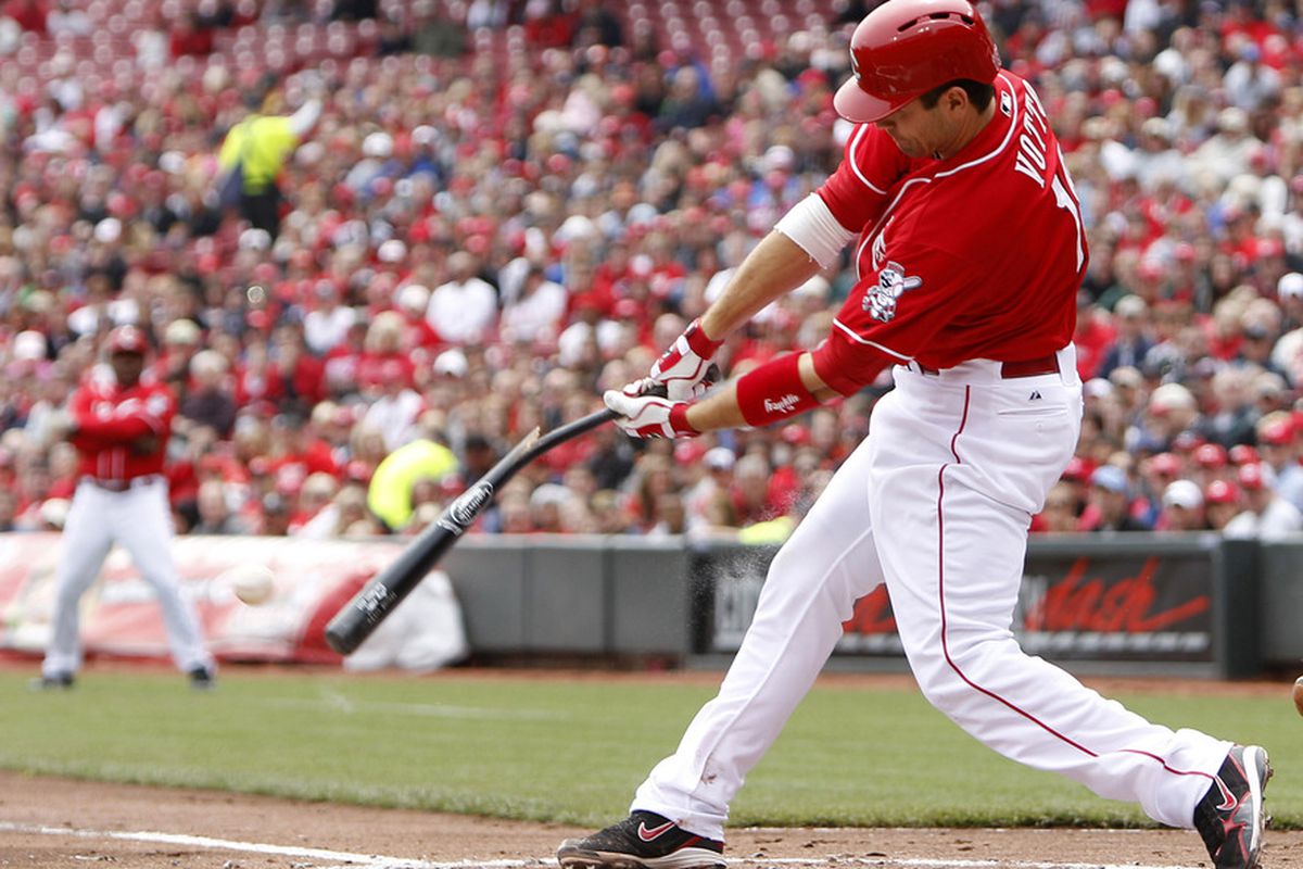 Cincinnati, OH, USA; Cincinnati Reds first baseman Joey Votto (19) breaks his bat flying out during the first inning against the Houston Astros at Great American Ballpark. Mandatory Credit: Frank Victores-US PRESSWIRE