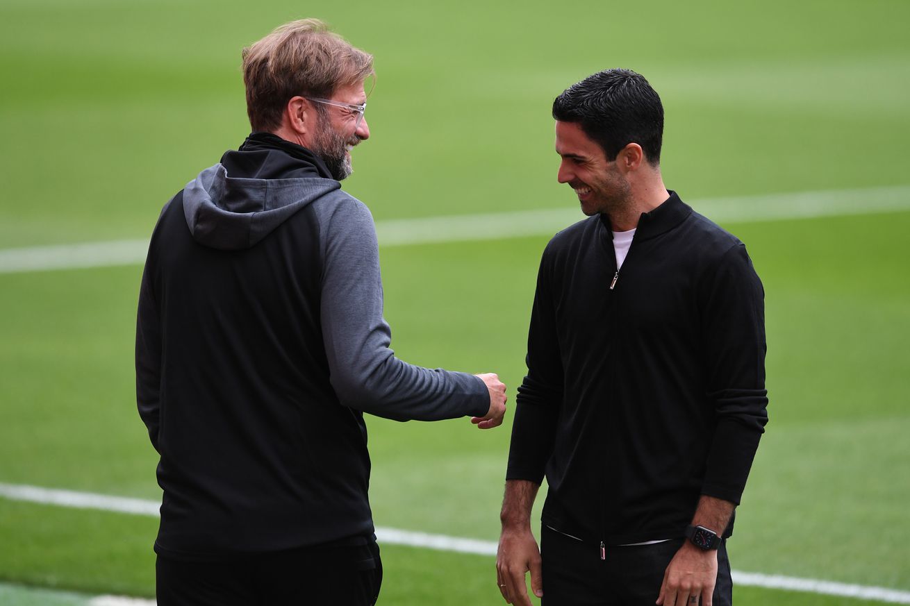 &nbsp;Mikel Arteta the Arsenal Head Coach says hello to Jurgen Klopp the Liverpool Manager before the Premier League match between Arsenal FC and Liverpool FC at Emirates Stadium on July 15, 2020