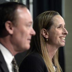 University of Colorado new women's NCAA college basketball head coach JR Payne, right, and athletic director Rick George speak during a news conference on Monday, March 28, 2016,in Boulder, Colo. (Jeremy Papasso/Daily Camera via AP) NO SALES; MANDATORY CREDIT 