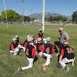 Coach Jeff Parrish talks to his Utah Bandits team about sportsmanship at baseball practice Thursday, June 20, 2013, in Riverton. Riverton will be closing the remaining five baseball fields at Riverton Park as of Aug. 15.