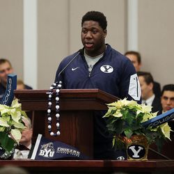 Brigham Young University football player JJ Nwigwe speaks during a fireside with the BYU football team in Las Vegas, Friday, Dec. 18, 2015.