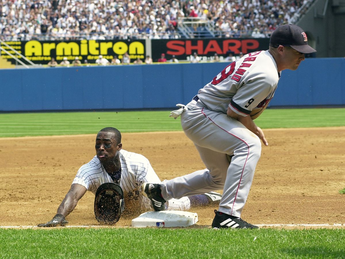 Boston Red Sox third baseman Shea Hillenbrand catches the la