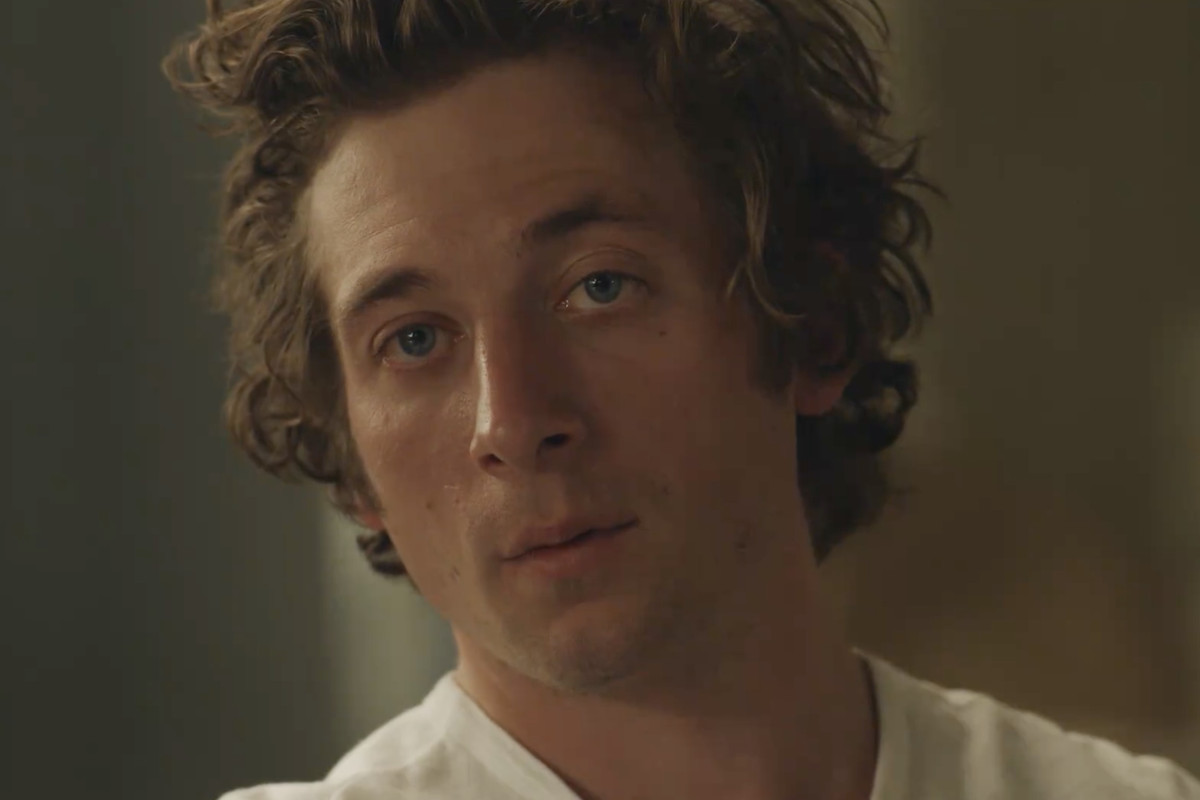 Jeremy Allen White, who plays Carmy in FX’s The Bear, stares at the camera in a screenshot from the first trailer for the show’s second season.