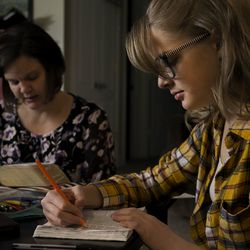 Arianna, 14, highlights passages in the Book of Mormon as her mother, Shari, reads scripture during their morning routine at their Layton home on Friday, Nov. 30, 2018. Each morning they meet in the living room to read scripture, write in their journals and breathe deeply to clear their minds.