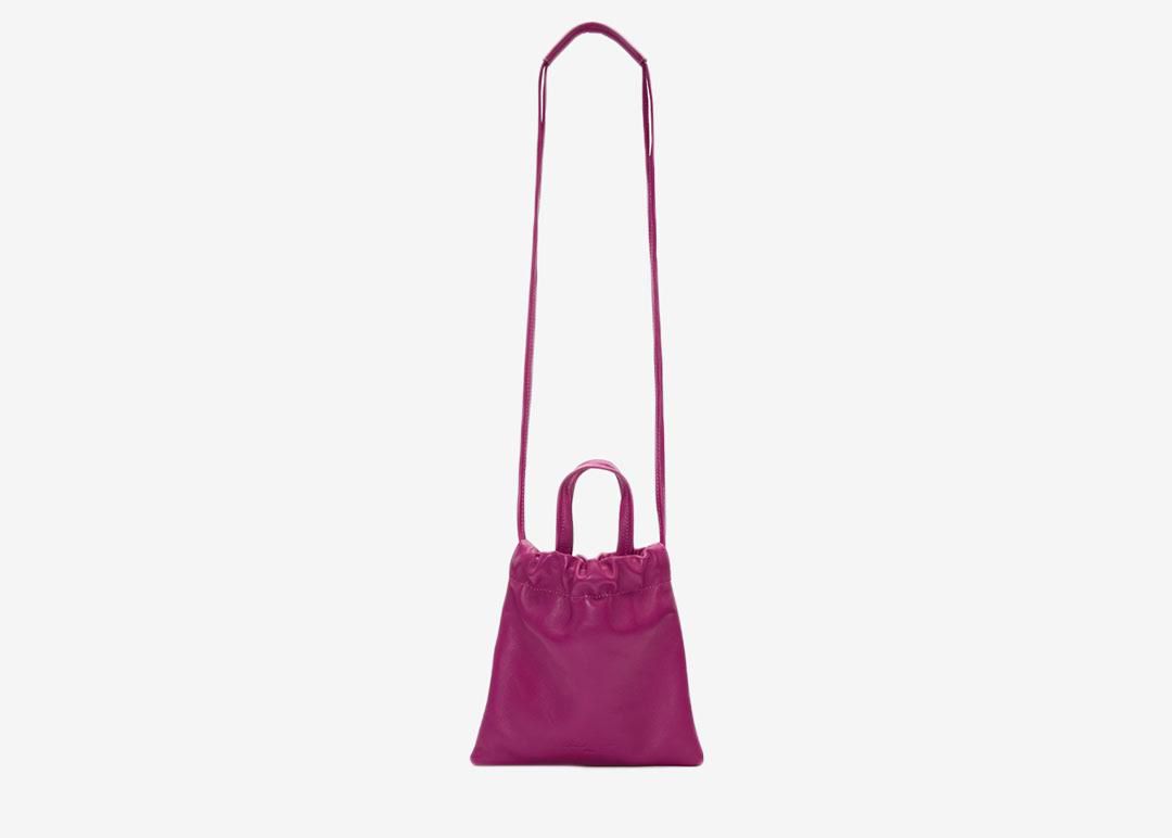 Hot pink scrunch tote with long strap. 