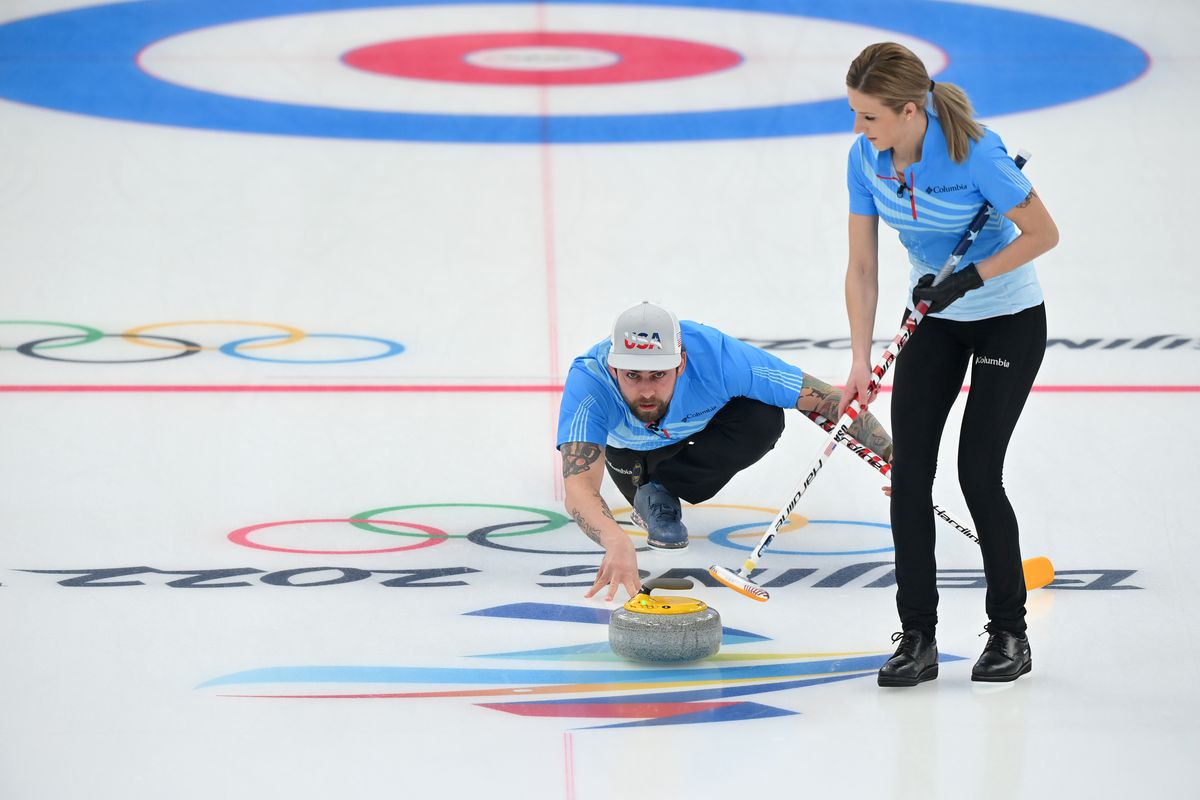 Sean Beighton and Victoria Persinger of Team United States compete during the Curling Mixed Doubles Round Robin ahead of the Beijing 2022 Winter Olympics at National Aquatics Centre on February 02, 2022 in Beijing, China.