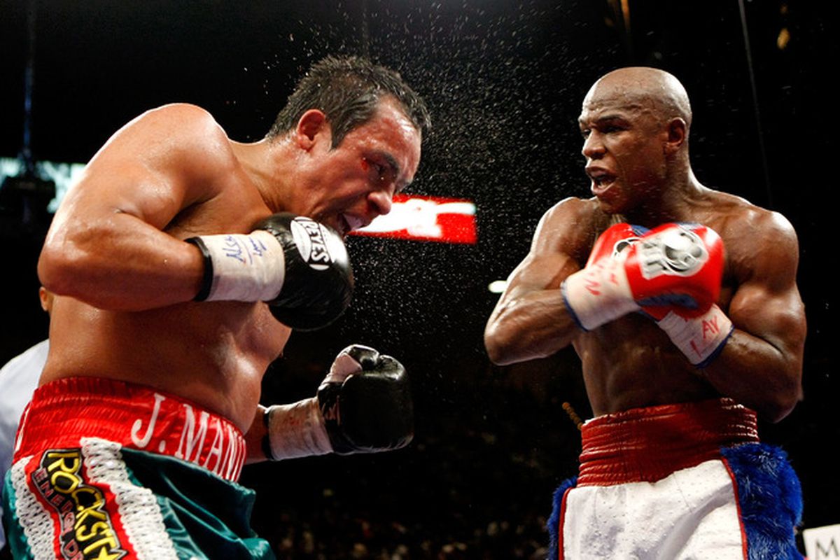 Floyd Mayweather Jr. was spectacular in picking apart Juan Manuel Marquez on Saturday night. But will he fight someone who promises a stiffer challenge, or will we always wonder what might have happened if he had? (Photo by Ethan Miller/Getty Images)