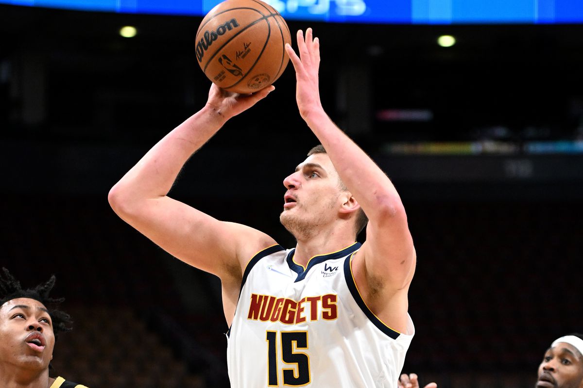 Denver Nuggets center Nikola Jokic (15) shoots the ball against the Toronto Raptors in the first half at Scotiabank Arena.