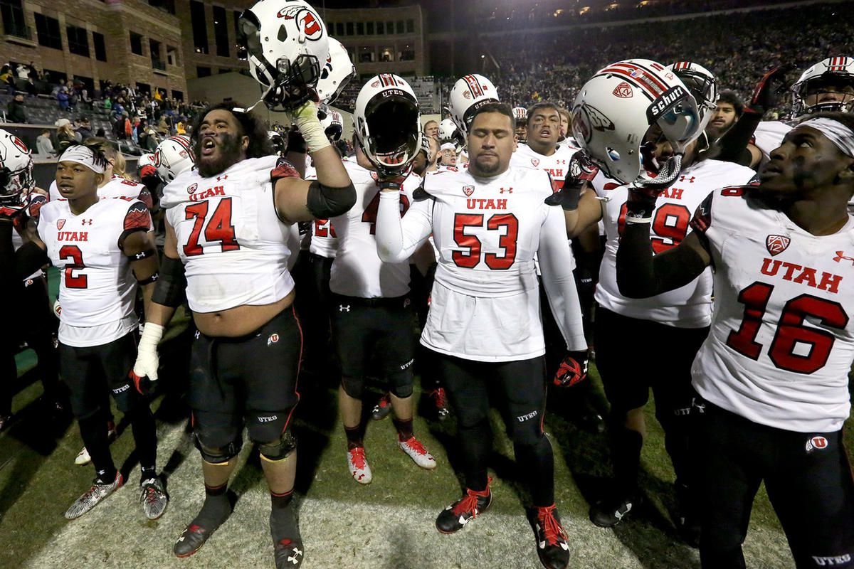 The Utah Utes cheer to their fans after losing to the Colorado Buffaloes in a football game at Folsom Field in Boulder, Colo., on Saturday, Nov. 26, 2016. Utah lost 22-27.