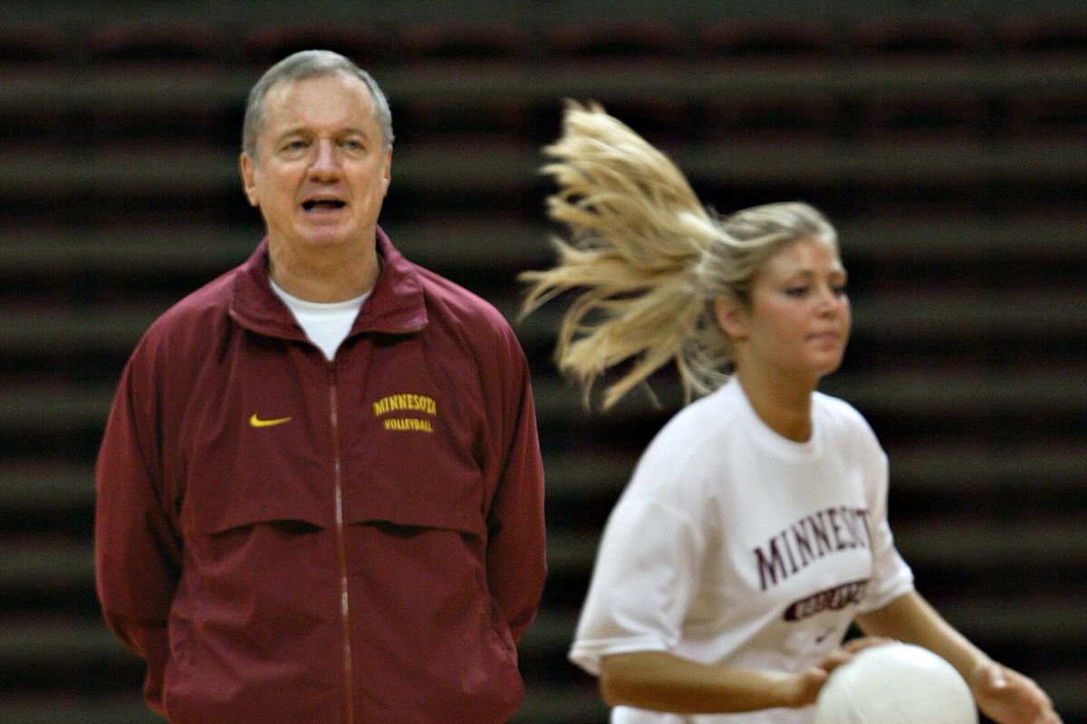 Bruce Bisping/Star Tribune. Minneapolis, MN., Monday, 11/29/04. Gophers Volleyball Coach Mike Hebert worked with his players during practice at the Sports Pavilion.