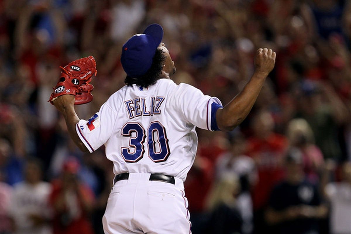 Neftali Feliz's recent elbow injury has his fantasy owners screaming along with him.  (Photo by Stephen Dunn/Getty Images)