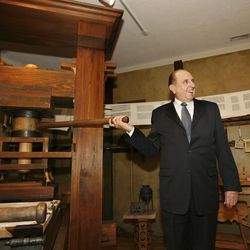 President Thomas S. Monson smiles after printing a page on a replica of the Gutenberg press at the opening of the Crandall Historical Printing Museum on Tuesday, April 21, 2009, in Provo, Utah.