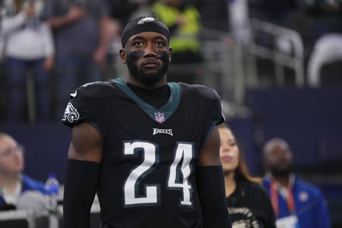 James Bradberry #24 of the Philadelphia Eagles stands during the national anthem against the Dallas Cowboys at AT&amp;T Stadium on December 24, 2022 in Arlington, Texas.