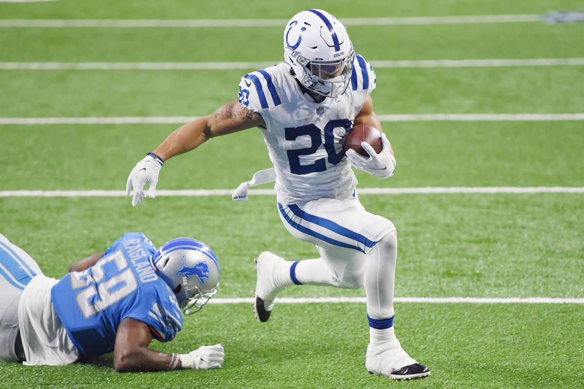 Jordan Wilkins #20 of the Indianapolis Colts scores a two-point conversion against the Detroit Lions during the fourth quarter at Ford Field on November 01, 2020 in Detroit, Michigan.