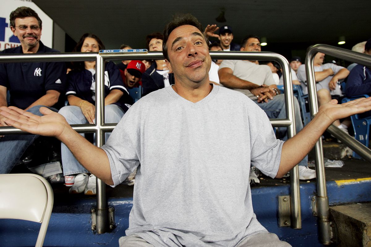 New York Yankees’ fan Robert Marchese shrugs after having tw