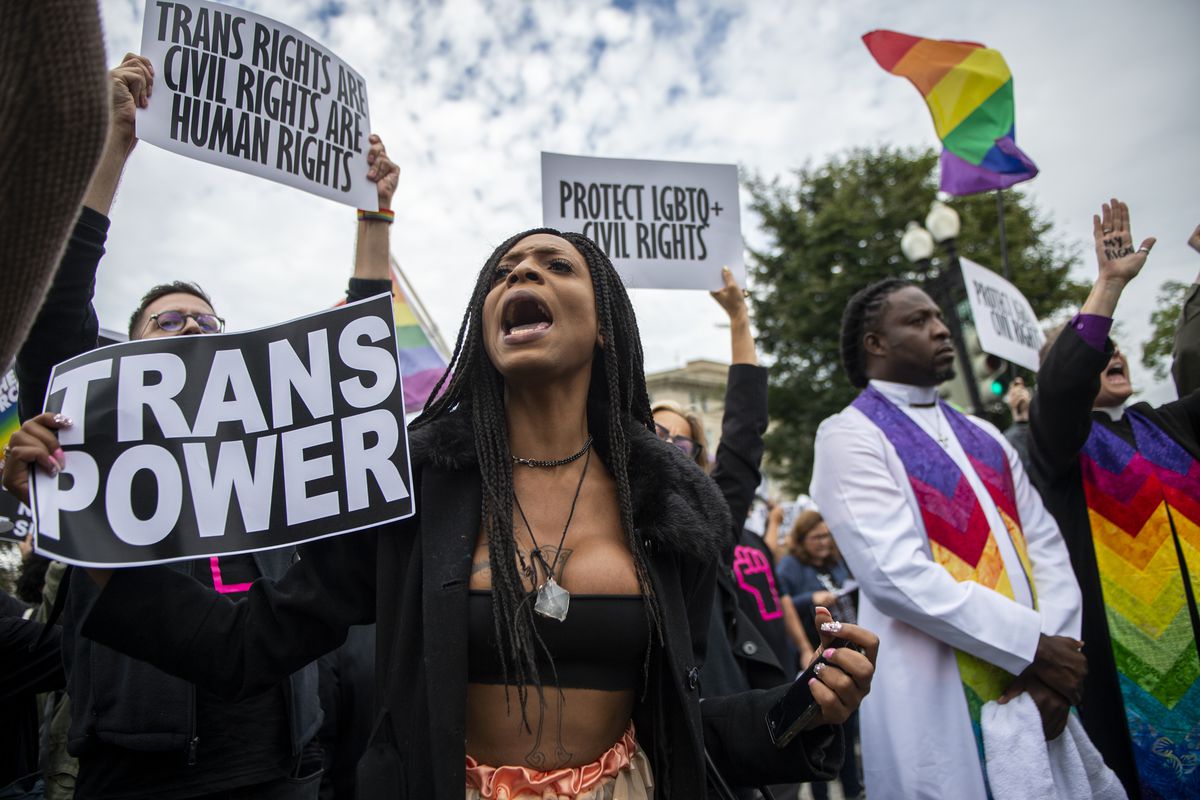 Protesters block the street in front of the Supreme Court as it hears arguments on whether gay and transgender people are covered by a federal law barring employment discrimination on the basis of sex on Tuesday, Oct. 8, 2019.