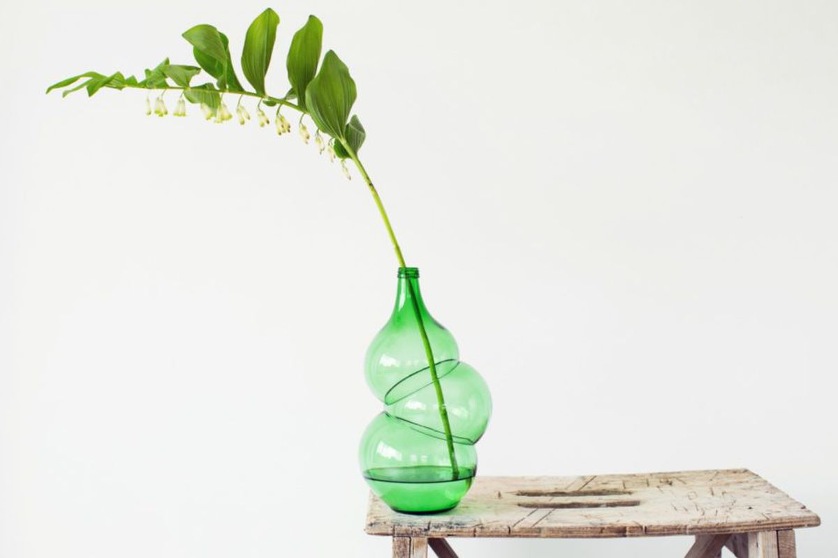 green glass bottles become vases