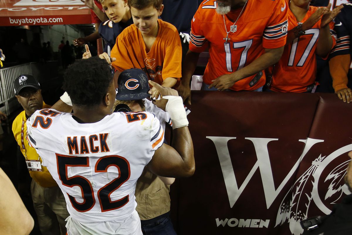 Chicago Bears outside linebacker Khalil Mack signs autographs for fans after the Bears game against Washington at FedExField.