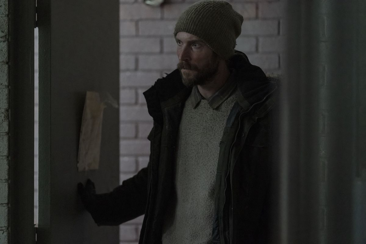 James (Troy Baker) entering a room
