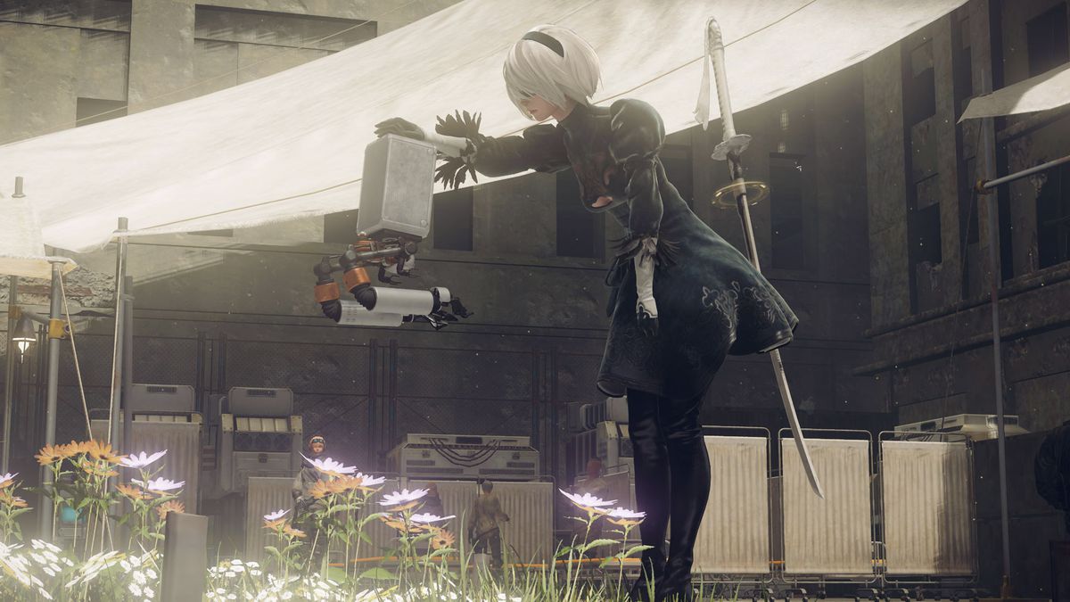 A screenshot of Nier: Automata in which 2B pets her robot pod