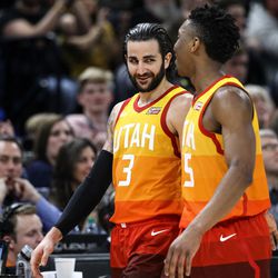 Utah Jazz guard Ricky Rubio (3) and guard Donovan Mitchell (45) head to the bench in the final moments of the Jazz's 129-99 win over the Golden State Warriors at Vivint Arena in Salt Lake City on Tuesday, Jan. 30, 2018.