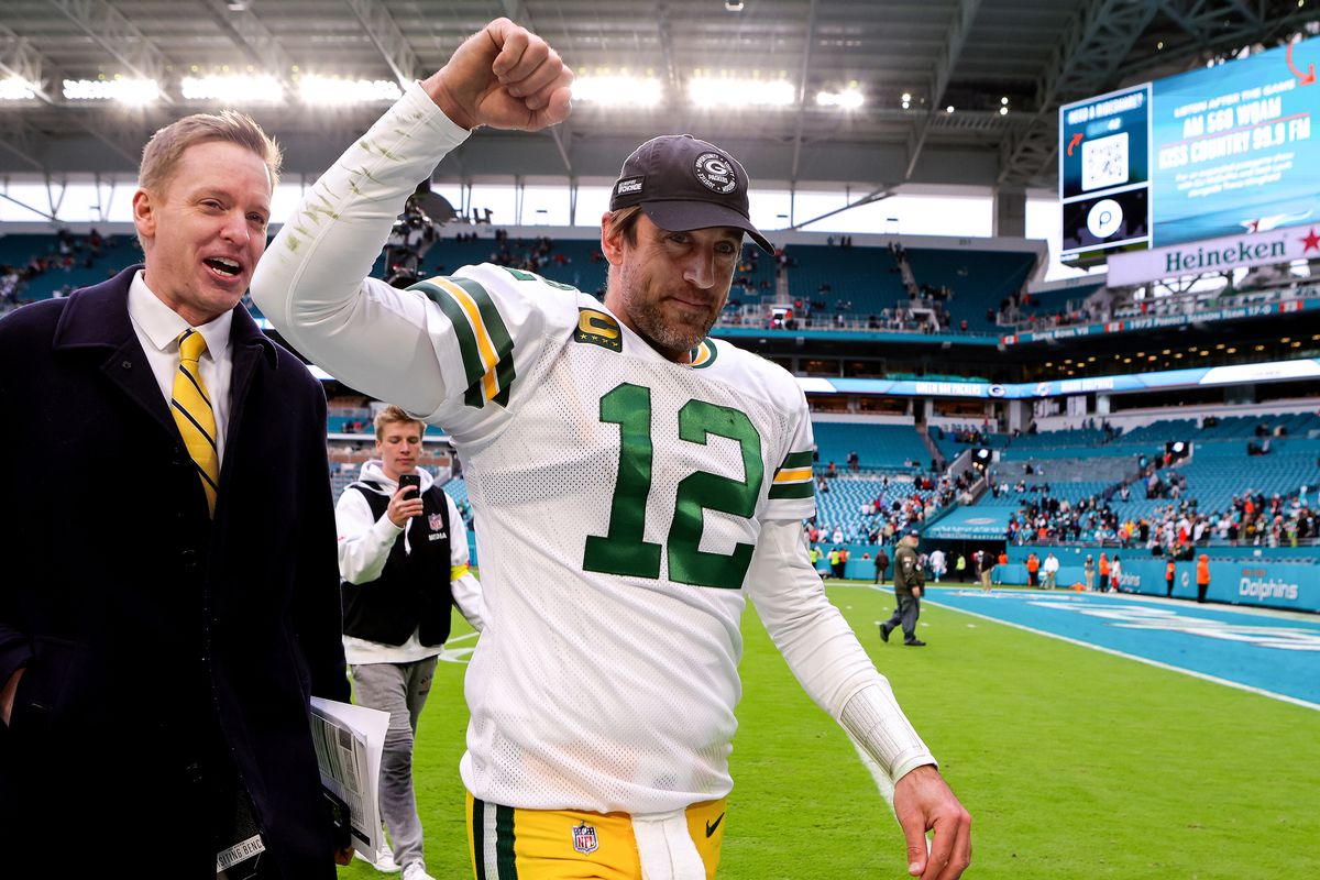 Aaron Rodgers #12 of the Green Bay Packers walks off the field after defeating the Miami Dolphins at Hard Rock Stadium on December 25, 2022 in Miami Gardens, Florida.