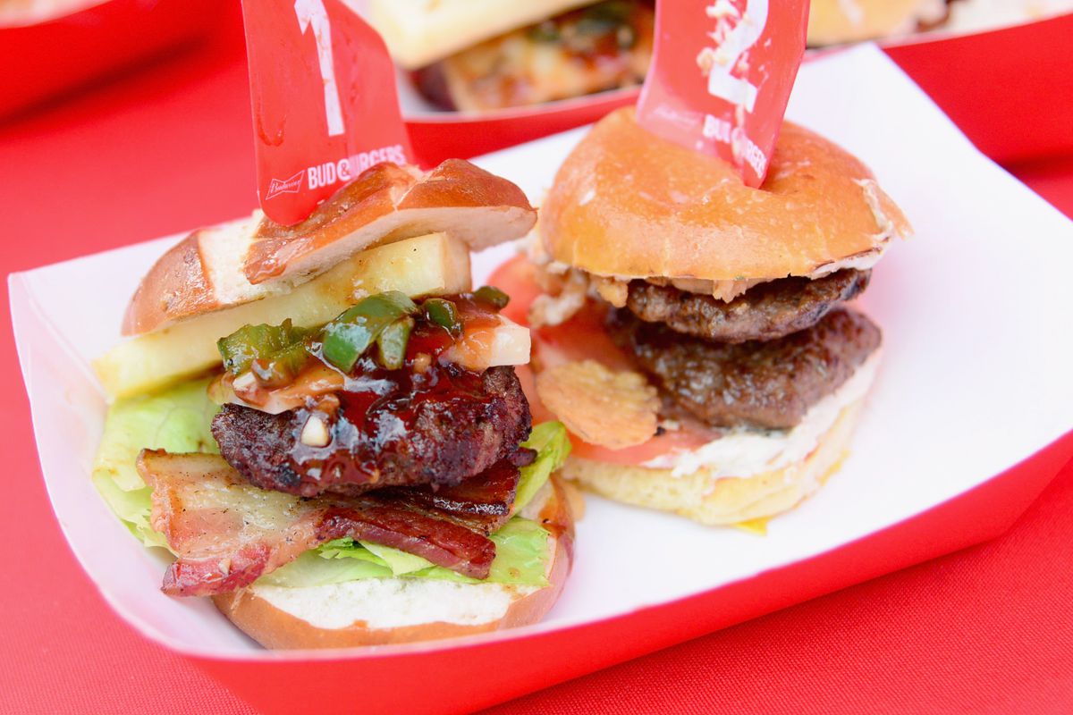 Picture of burgers sitting on a table at the 2016 Budweiser Made in America Festival.