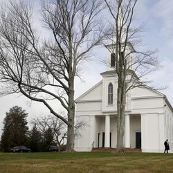 Lamington Presbyterian Church is seen from the media van in Bedminster, N.J., Sunday, Nov. 20, 2016, as President-elect Donald Trump attends services. A leaked copy of a draft of an executive order on religious freedom was released by The Nation on Wednesday that would provide broad protections Trump promised to religious conservative supporters.