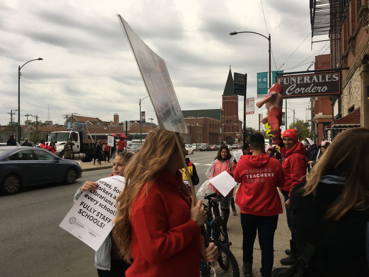 Teachers, parents and students in Pilsen marched up and down Ashland Avenue on Monday, Oct. 21, 2019.