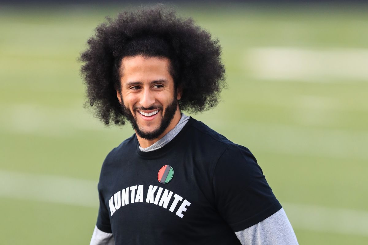 Colin Kaepernick looks on during a private NFL workout held at Charles R Drew high school on November 16, 2019 in Riverdale, Georgia. Due to disagreements between Kaepernick and the NFL the location of the workout was abruptly changed.