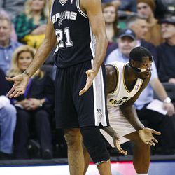 Utah Jazz's power forward Marvin Williams (2) reacts after being called for a foul on Spurs' Tim Duncan as the Utah Jazz and the San Antonio Spurs play Saturday, Dec. 14, 2013 at EnergySolutions Arena in Salt Lake City. The Spurs won 100-84.