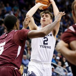 Brigham Young Cougars guard Zac Seljaas (2) shoots over Texas Southern Tigers center Trayvon Reed (5) as BYU and Texas Southern play an NCAA basketball game in Provo at the Marriott Center on Saturday, Dec. 23, 2017. BYU won 73-52.