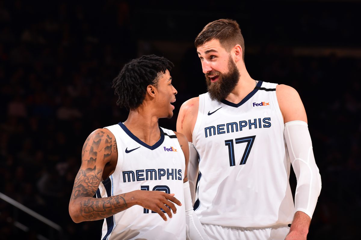 Ja Morant, and Jonas Valanciunas of the Memphis Grizzlies talk to each other during the game against the New York Knicks on January 29, 2020 at Madison Square Garden in New York City, New York.&nbsp;