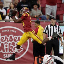 Southern California wide receiver Tyler Vaughns (21) makes a touchdown catch over Utah defensive back Jaylon Johnson (1) during the first half of an NCAA college football game Friday, Sept. 20, 2019, in Los Angeles.
