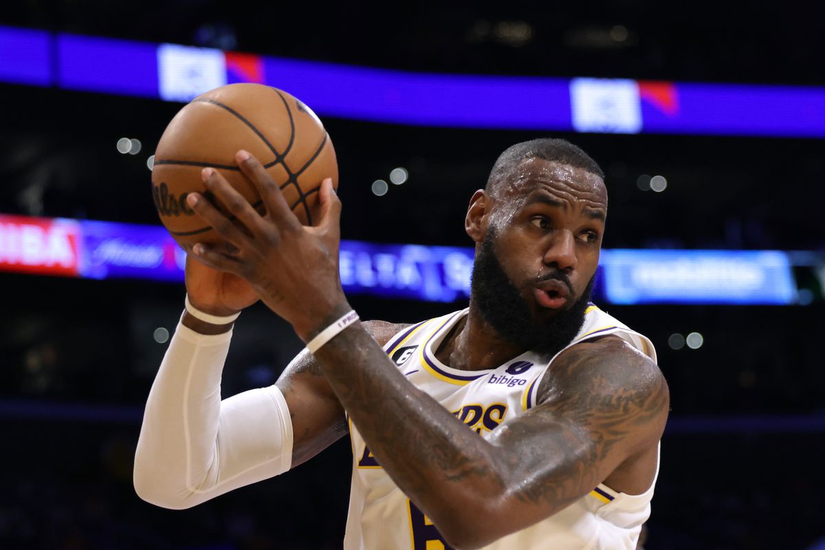 LeBron James of the Los Angeles Lakers grabs a rebound during a 128-117 Lakers win over the Utah Jazz at Crypto.com Arena on April 09, 2023 in Los Angeles, California.