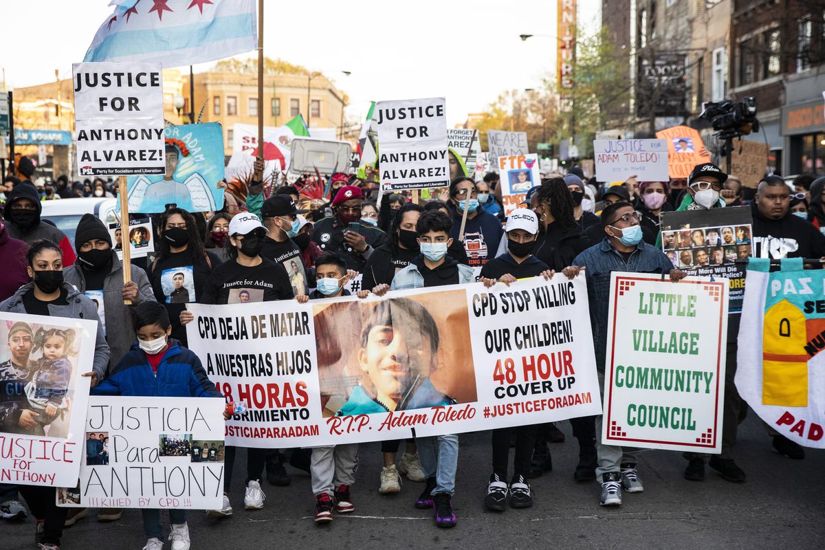 Protesters march on April 16, 2021 near Mayor Lori Lightfoot’s home.
