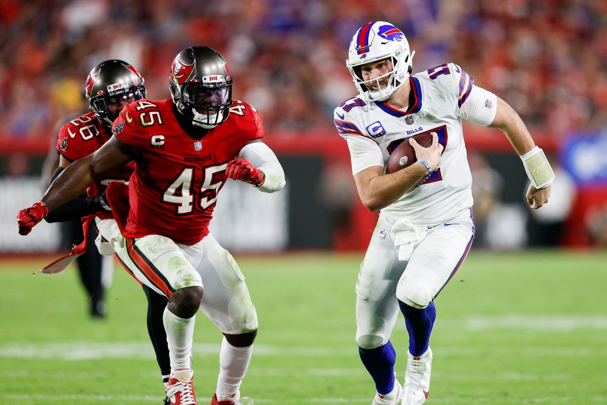 Buffalo Bills quarterback Josh Allen (17) avoids a tackle from Tampa Bay Buccaneers linebacker Devin White (45) in the second half at Raymond James Stadium.
