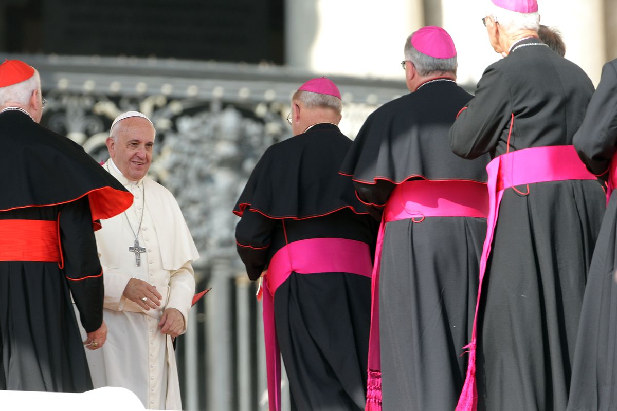 Pope Francis greets bishops during his weekly audience at St. Peter's Square on October 8, 2014 in Vatican City, Vatican.