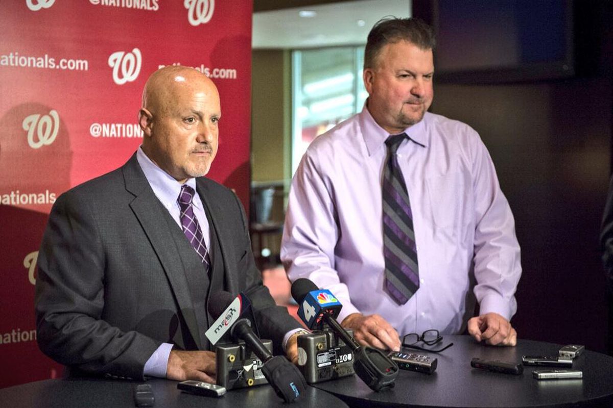 Washington Nationals' GM Mike Rizzo (left) and Assistant GM Kris Kline talk after the 1st Round of the 2014 Draft.