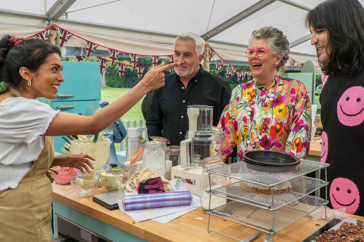 Contestant Crystelle with Paul, Prue, and Noel on Great British Bake Off 2021